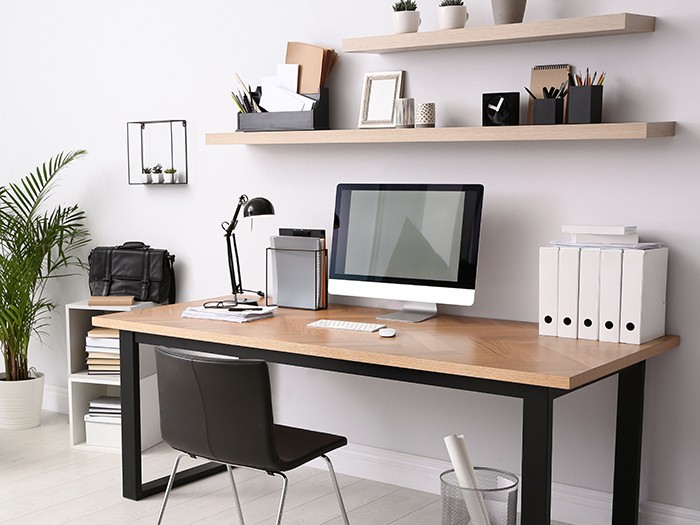 Modern computer on table in office interior. Stylish workplace